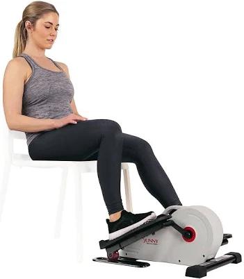 Sunny Health & Fitness Fully Assembled Magnetic Under Desk Elliptical Peddler, Portable Foot & Leg Pedal Exerciser (White/Pink)