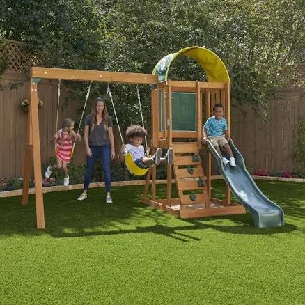 KidKraft Ainsley Wooden Outdoor Swing Set with Slide and Rock Wall