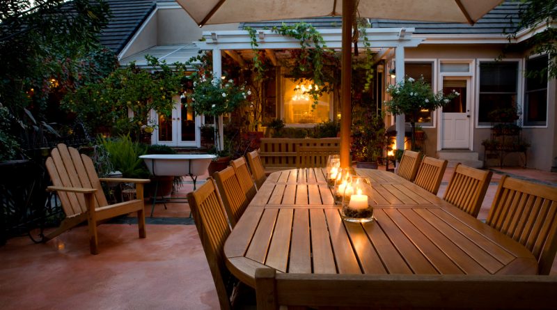 wooden-patio-furniture-set-with-long-table-and-chairs-and-canvas-umbrella