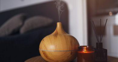 Best home air humidifiers - An air humidifier on a wooden table at home.